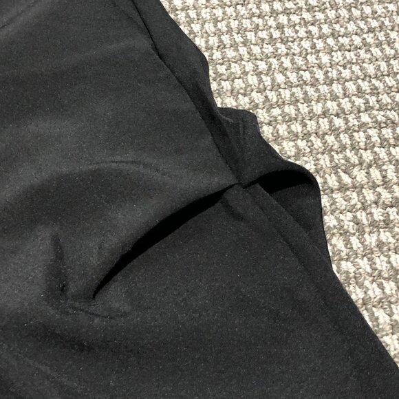Black baggy slacks with folds. Beautiful peice, the folds make it sit right, so - Picture 3 of 6